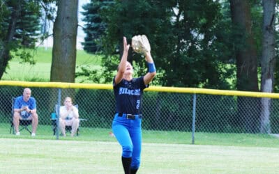 Softball squad takes playoff win at home